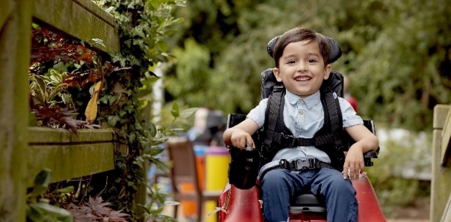 A young boy smiling