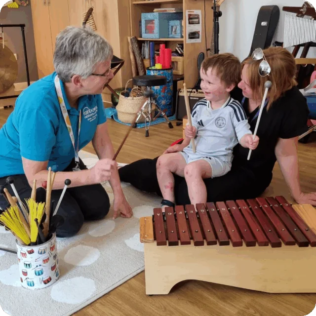 Leo and Tracy in Music Therapy